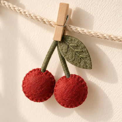 Cherry felt leaf cord and clip detail